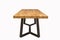 Wooden lacquered table with black legs on white background