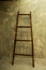 Wooden ladder decorated on wall