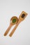 Wooden ladles with some herbs and food spices