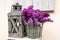 Wooden lamp and bouquet of purple lilac