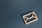 Wooden letter envelope. Contact concept. Postal correspondence. Mail notification. Communication internet technologies. Email.