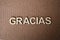 Wooden letters forming the words Gracias in Spanish