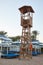 Wooden lifeguard tower on the sand beach.