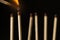 Wooden lighted matches, standing on a black background