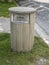 The wooden litter bin