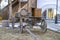 Wooden loaded cart in the courtyard of an old house.