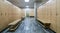 Wooden lockers with a wood bench in a locker room