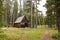 Wooden lodge in forest