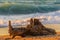 Wooden log at Sunset at Agios Ioannis beach in Lefkada