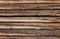 Wooden logs wall of old house background