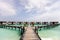 Wooden long bridge in beautiful loneliness beach ocean