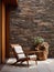 Wooden lounge chair near wild stone cladding wall