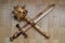 Wooden Mace and sword lie on the floor, children`s toys made of natural materials