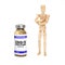 Wooden man figure with a coronavirus vaccine showing suspicious about the new COVID-19 vaccine