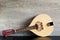 Wooden Mandolin on a Black Table