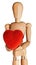 Wooden Mannequin Holding Soft Red Heart in Both Hands