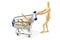 Wooden mannequin shopping with a cart on white backgrou