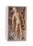 Wooden mannikin standing in closed cardboard box filled with wood shred. Concept of loneliness, isolation