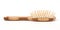 Wooden massage comb over white