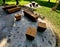 wooden massive park bench shape block with metal legs on granite