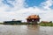 Wooden and metal houses built on stilts above the water of Tonle Sap lake, Kampong Phluk, Cambodia