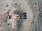 Wooden mining structure head frame on claim in the Nevada desert top down view drone