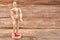 Wooden modeling figure, wooden background.