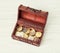 Wooden money chest filled with coins
