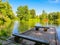 Wooden mooring on the forest lake