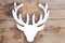 Wooden moose head on wooden background