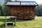 Wooden mountain hay house, cut wood, Cadore in Dolomity mountains, Italy