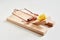 Wooden mousetrap with cheese in close-up