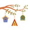 Wooden multi-colored birdhouses hang on tree branch