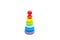 A wooden multicolored pyramid against a white background. Education concept.