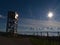 Wooden observation tower on vineyard slopes above small village Hagnau am Bodensee, Lake Constance, Germany.