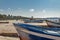 Wooden old blue and white boats on the Mediterranean coast in Spain, Salou beach