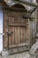 wooden old door locked with a padlock