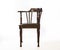 Wooden, old-fashioned corner chair. Isolated.