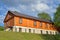 Wooden one-storeyed apartment house on the embankment of the riv