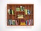 Wooden open shelves with books.