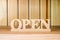 Wooden open signage