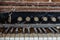 wooden organ with cobwebs