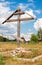 Wooden orthodox cross in russian village in summer day