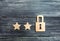 Wooden padlocks and three stars. Security, security of users and business. Internet security, antivirus, data protection. Alarms o