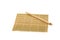 Wooden pairs of chopsticks on white background