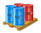 Wooden pallet and metal barrels with oil and petrol.