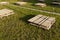 wooden pallets on the grass, close up