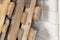 Wooden pallets in a warehouse, cart of white bricks