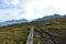 Wooden path in mountains near Kvalvika beach