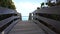 Wooden path over sand dunes with ocean view